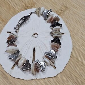 JBB Natural Shell and Silver Bird Bracelet with Toggle Clasp Joshua Benbassat